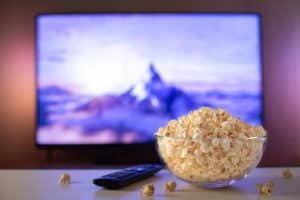 Movie screen and bowl of popcorn