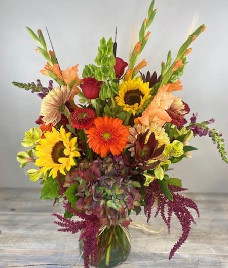Autumn skies offers a wide array of fall flowers in seasonal colors.